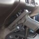 For use in vehicles and at home, a magnetic gun holster